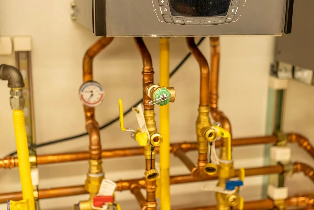 Licensed technician providing Water Heater Installation for a homeowner in Troy